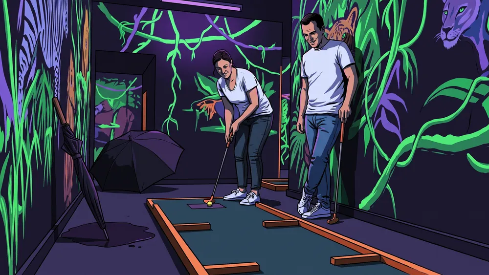 Schwarzlichtlöwen Minigolf in Braunschweig – zwei Personen spielen Minigolf unter UV-Licht