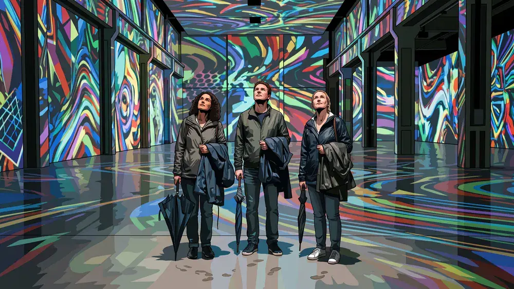 Phoenix des Lumières in Dortmund – drei Personen mit nassen Jacken in der Halle voller digitaler Kunstprojektionen