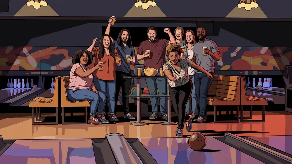 Bowling in Kassel - Gruppe jubelt an der Bahn beim Wurf