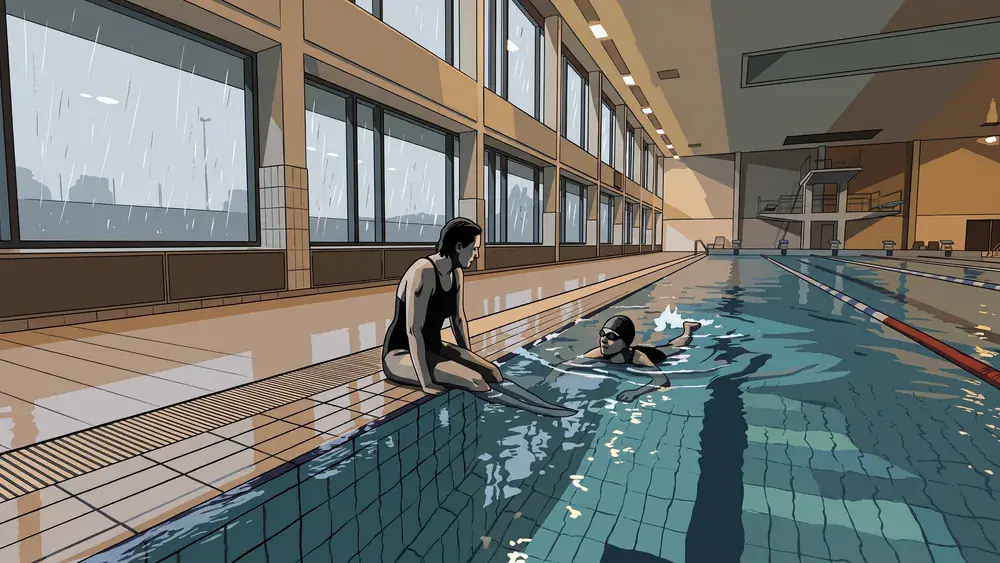 Stadthallenbad in Wien – Zwei Personen am 50-Meter-Becken, während oben an den hohen Fensterreihen der Regen herunterläuft